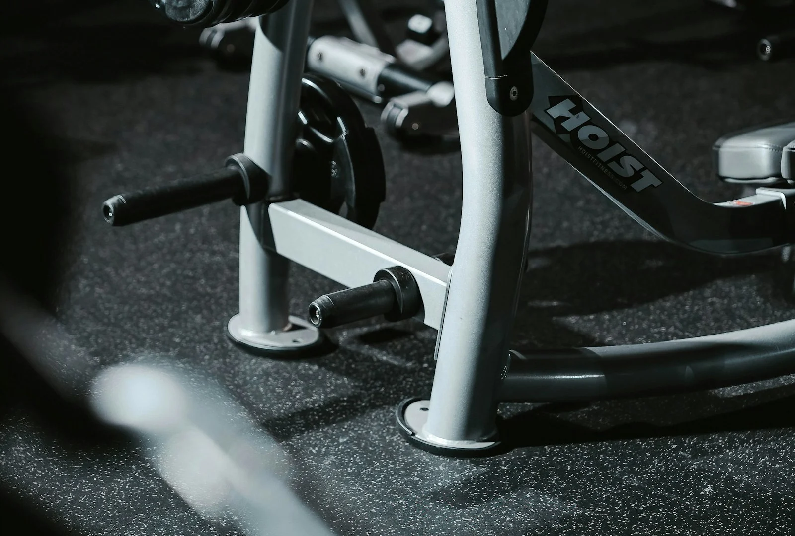 Assorted gym accessories on a rack